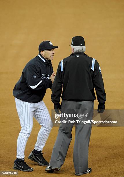 Manager Joe Girardi of the New York Yankees argues after a call with umpire Brian Gorman in the seventh inning against the Philadelphia Phillies...