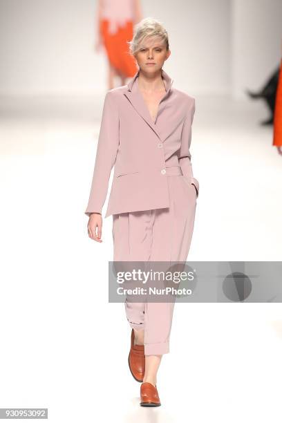 Model walks the catwalk during the fashion designer Ricardo Preto Fall / Winter 2018 - 2019 collection runway show at the 50 edition of Lisboa...