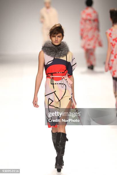 Model walks the catwalk during the fashion designer Ricardo Preto Fall / Winter 2018 - 2019 collection runway show at the 50 edition of Lisboa...