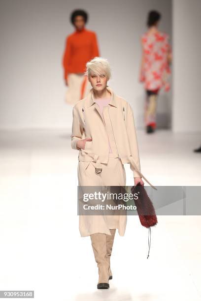 Model walks the catwalk during the fashion designer Ricardo Preto Fall / Winter 2018 - 2019 collection runway show at the 50 edition of Lisboa...