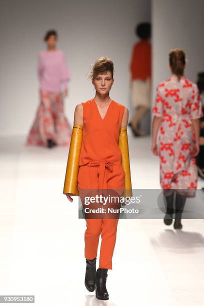 Model walks the catwalk during the fashion designer Ricardo Preto Fall / Winter 2018 - 2019 collection runway show at the 50 edition of Lisboa...