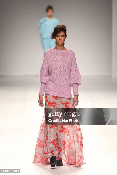 Model walks the catwalk during the fashion designer Ricardo Preto Fall / Winter 2018 - 2019 collection runway show at the 50 edition of Lisboa...