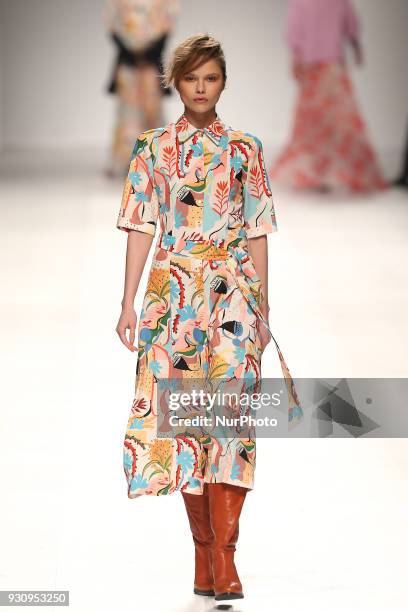 Model walks the catwalk during the fashion designer Ricardo Preto Fall / Winter 2018 - 2019 collection runway show at the 50 edition of Lisboa...