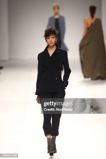 Model walks the catwalk during the fashion designer Ricardo Preto Fall / Winter 2018 - 2019 collection runway show at the 50 edition of Lisboa...