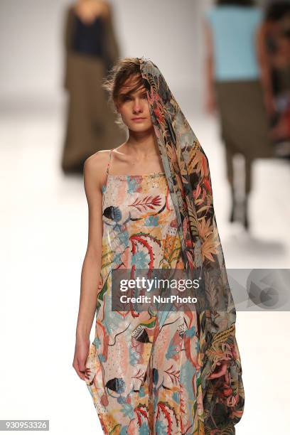 Model walks the catwalk during the fashion designer Ricardo Preto Fall / Winter 2018 - 2019 collection runway show at the 50 edition of Lisboa...