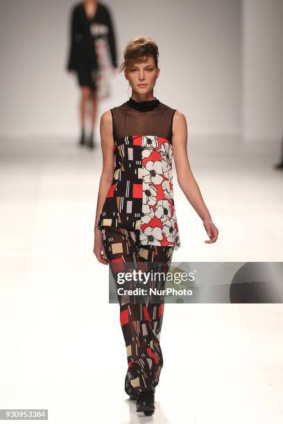 Model walks the catwalk during the fashion designer Ricardo Preto Fall / Winter 2018 - 2019 collection runway show at the 50 edition of Lisboa...