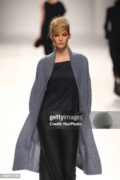 Model walks the catwalk during the fashion designer Ricardo Preto Fall / Winter 2018 - 2019 collection runway show at the 50 edition of Lisboa...