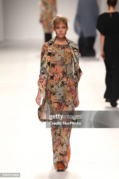 Model walks the catwalk during the fashion designer Ricardo Preto Fall / Winter 2018 - 2019 collection runway show at the 50 edition of Lisboa...