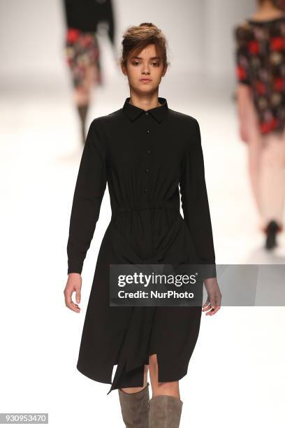 Model walks the catwalk during the fashion designer Ricardo Preto Fall / Winter 2018 - 2019 collection runway show at the 50 edition of Lisboa...