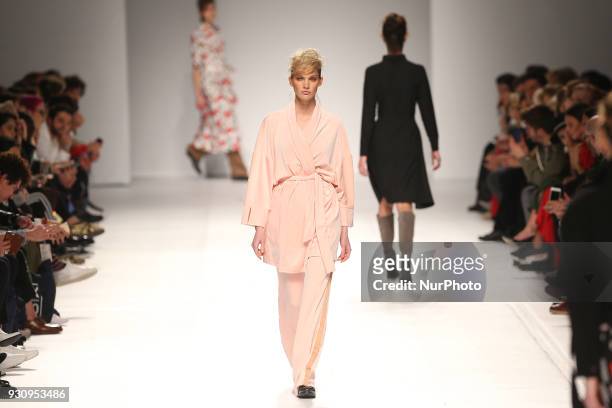 Model walks the catwalk during the fashion designer Ricardo Preto Fall / Winter 2018 - 2019 collection runway show at the 50 edition of Lisboa...