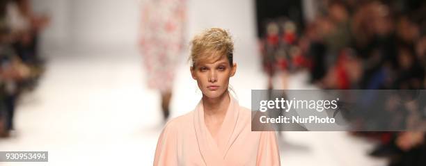 Model walks the catwalk during the fashion designer Ricardo Preto Fall / Winter 2018 - 2019 collection runway show at the 50 edition of Lisboa...