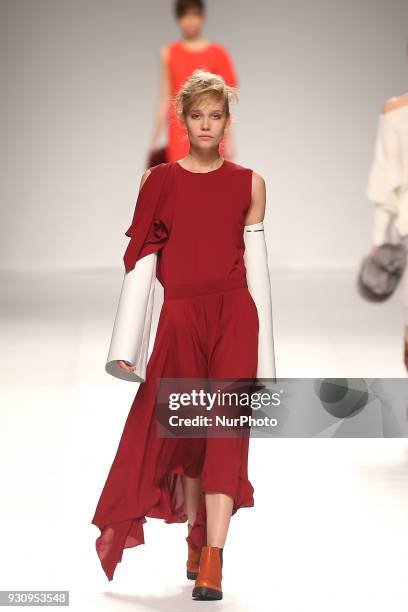 Model walks the catwalk during the fashion designer Ricardo Preto Fall / Winter 2018 - 2019 collection runway show at the 50 edition of Lisboa...