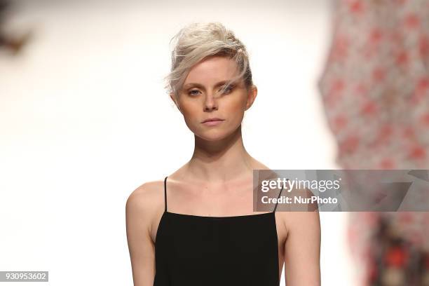 Model walks the catwalk during the fashion designer Ricardo Preto Fall / Winter 2018 - 2019 collection runway show at the 50 edition of Lisboa...