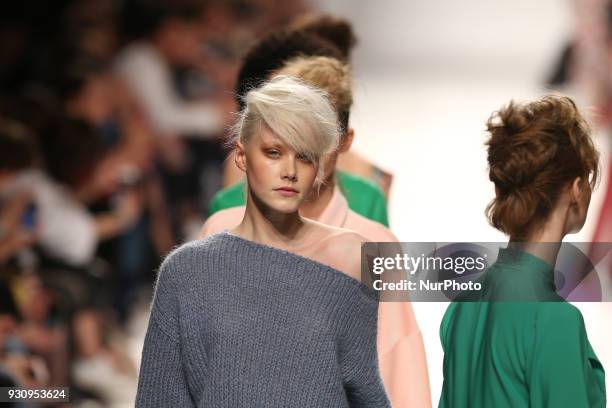 Model walks the catwalk during the fashion designer Ricardo Preto Fall / Winter 2018 - 2019 collection runway show at the 50 edition of Lisboa...