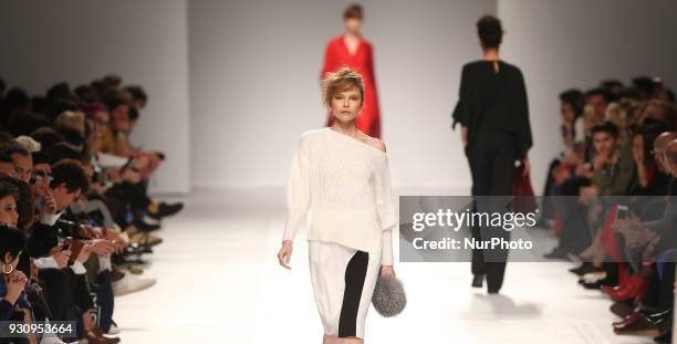 Model walks the catwalk during the fashion designer Ricardo Preto Fall / Winter 2018 - 2019 collection runway show at the 50 edition of Lisboa...