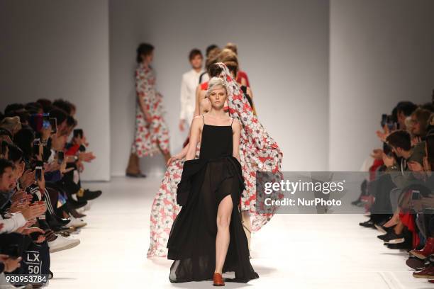 Model walks the catwalk during the fashion designer Ricardo Preto Fall / Winter 2018 - 2019 collection runway show at the 50 edition of Lisboa...