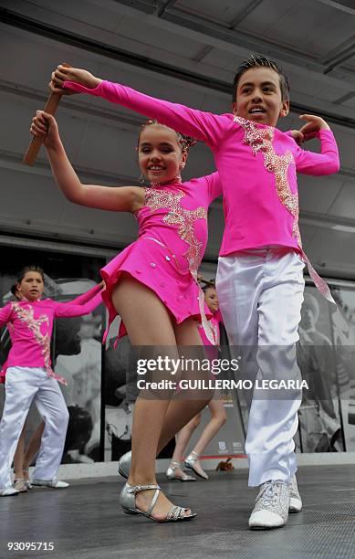 Colombian dancers couple performs during a "Marathon of Salsa" as part of the second Bogota's Dances in the City Festival, on November 16 at the...