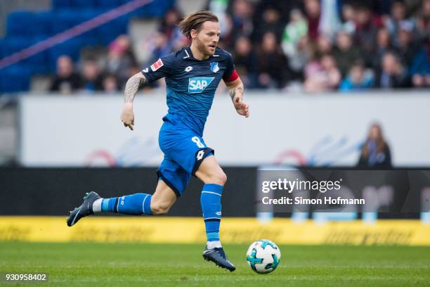 Eugen Polanski of Hoffenheim controls the ball during the Bundesliga match between TSG 1899 Hoffenheim and VfL Wolfsburg at Wirsol Rhein-Neckar-Arena...