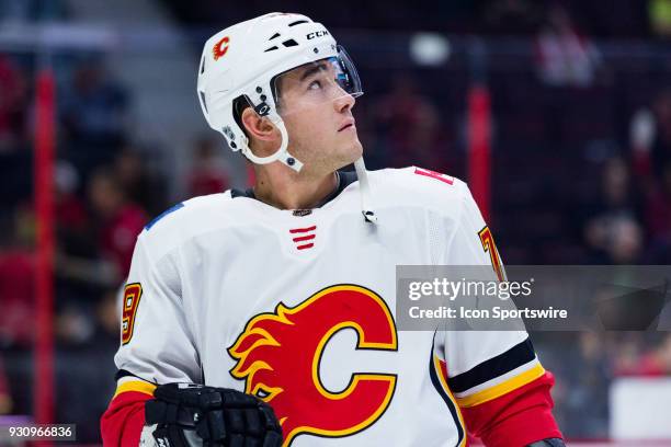 Calgary Flames Right Wing Micheal Ferland looks up at the clock during warm-up before National Hockey League action between the Calgary Flames and...