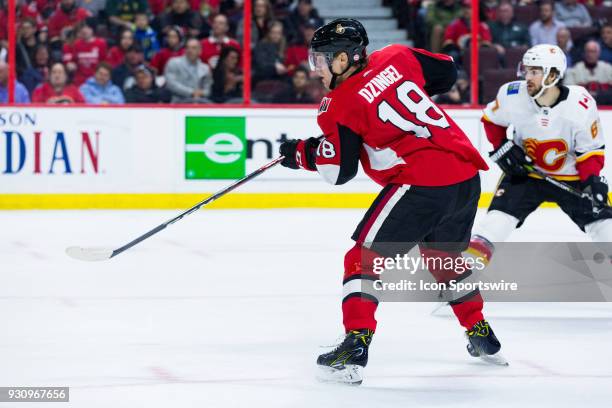 Ottawa Senators Left Wing Ryan Dzingel follows through on a shot during third period National Hockey League action between the Calgary Flames and...