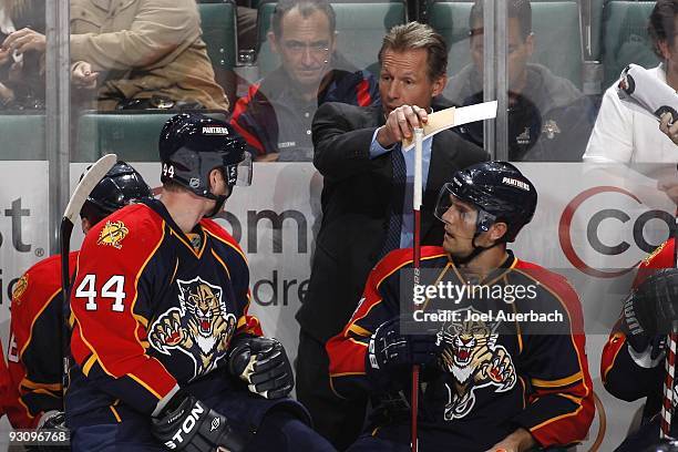 Assistant coach Mike Kitchen talks to Jordan Leopold of the Florida Panthers during a time out against the New York Islanders on November 14, 2009 at...