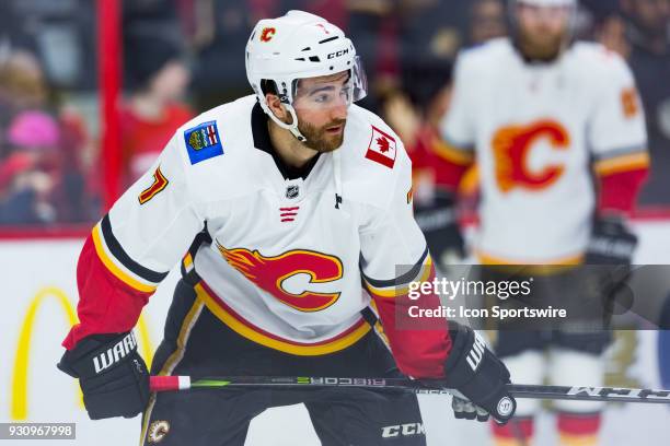 Calgary Flames Defenceman T.J. Brodie takes a moment during warm-up before National Hockey League action between the Calgary Flames and Ottawa...