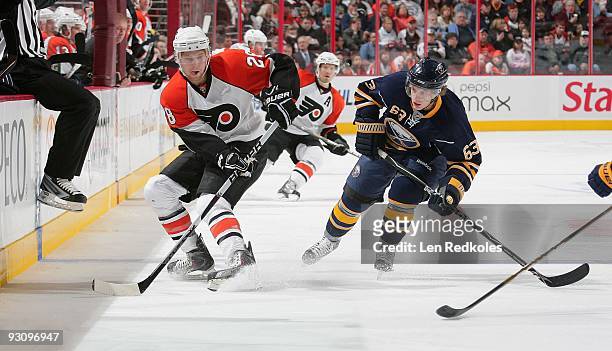 Claude Giroux of the Philadelphia Flyers skates against Tyler Ennis of the Buffalo Sabres on November 14, 2009 at the Wachovia Center in...