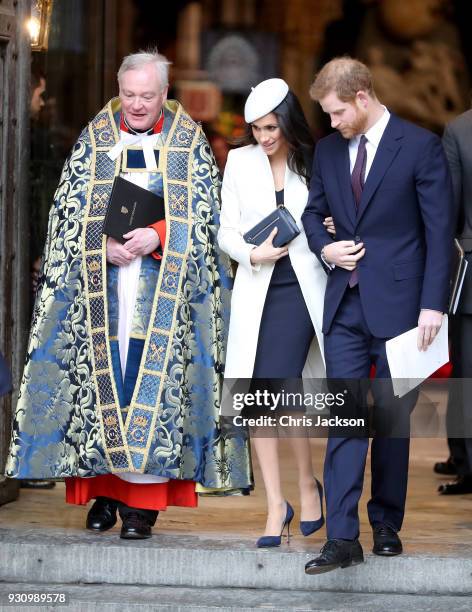 Meghan Markle and Prince Harry depart from the 2018 Commonwealth Day service at Westminster Abbey on March 12, 2018 in London, England.