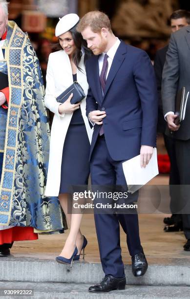 Meghan Markle and Prince Harry depart from the 2018 Commonwealth Day service at Westminster Abbey on March 12, 2018 in London, England.