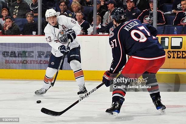 Ales Hemsky of the Edmonton Oilers fires a shot past Rostislav Klesla of the Columbus Blue Jackets for a goal during the second period on November...
