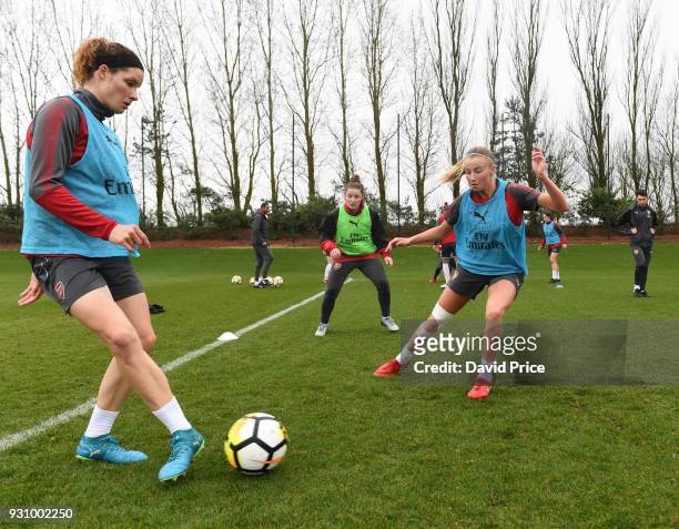 Dominique Janssen and Leah Williamson of Arsenal during an Arsenal Women Training Session at London Colney on March 12, 2018 in St Albans, England.