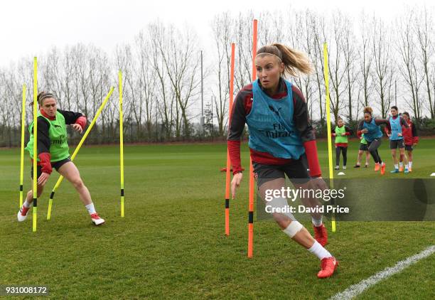 Heather O'Reilly and Leah Williamson of Arsenal during an Arsenal Women Training Session at London Colney on March 12, 2018 in St Albans, England.
