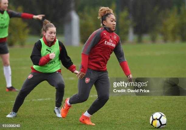 Lauren James and Kim Little of Arsenal during an Arsenal Women Training Session at London Colney on March 12, 2018 in St Albans, England.