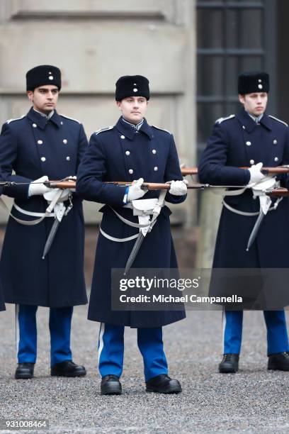 Guards are seen ahead of the Crown Princess Victoria of Sweden's name day celebrations at the Stockholm Royal Palace on March 12, 2018 in Stockholm,...