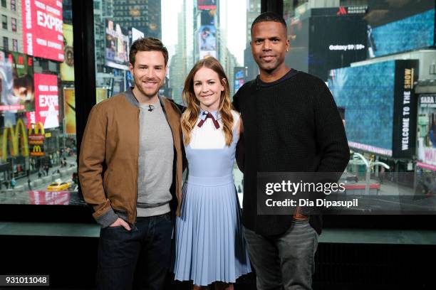 Calloway poses with Britt Robertson and Ben Rappaport during their visit with "Extra" at their New York studios at the Renaissance New York Times...