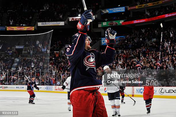 Rick Nash of the Columbus Blue Jackets celebrates after his teammate Antoine Vermette of the Columbus Blue Jackets scored the game tying goal during...