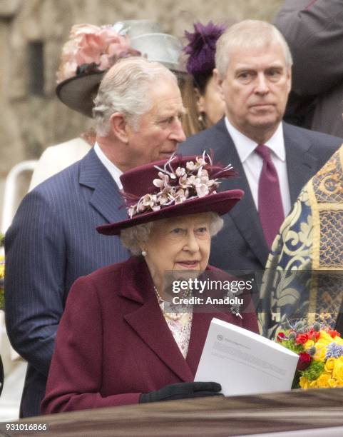 Queen Elizabeth II accompanied by her son The Prince of Wales Prince Charles and the Duke of York leave Westminster Abbey after celebrating a service...