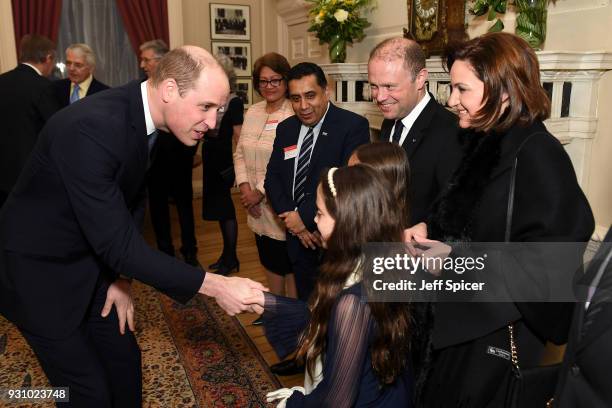 Prince William, Duke of Cambridge meets the Prime Minister of Malta Joseph Muscat , his wife Michelle Muscat and their daughters as he attends the...