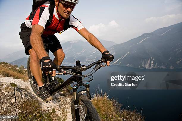 mountain biking - garda stock pictures, royalty-free photos & images