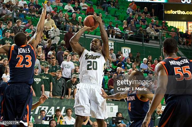 Guard Dominique Jones of the South Florida Bulls shoots against the Virginia Cavaliers during the game at the SunDome on November 16, 2009 in Tampa,...