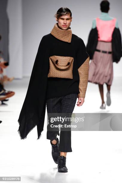 Model walks the runway during the Dino Alves show as part of the Lisboa Fashion Week ‘Moda Lisboa’ 2018 on March 11, 2018 in Lisbon, Portugal.