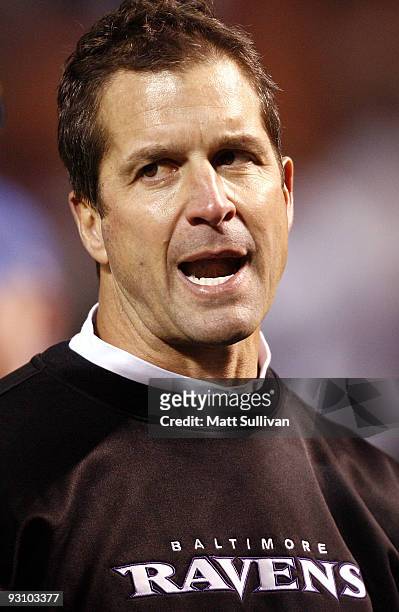 John Harbaugh head coach of the Baltimore Ravens leaves the field after their game against the Cleveland Browns at Cleveland Browns Stadium on...
