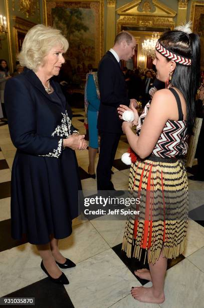 Camilla, Duchess of Cornwall and Prince William, Duke of Cambridge meet with performers as they attend the 2018 Commonwealth Day reception at...