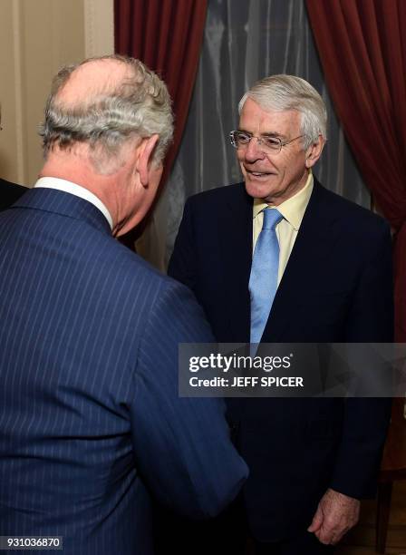 Britain's Prince Charles, Prince of Wales , meets Former British Conservative Prime Minister John Major at the 2018 Commonwealth Day reception at...