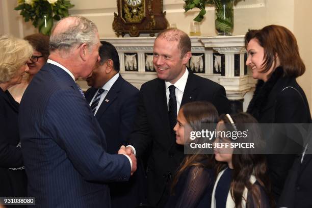 Britain's Prince Charles, Prince of Wales ,meets the Prime Minister or Malt Joseph Muscat , his wife Michelle Muscat and their daughters as they...
