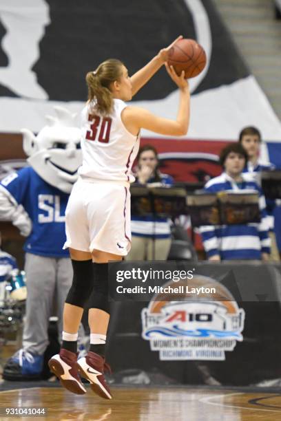 Sarah Veilleux of the St. Joseph's Hawks takes a jump shot during the semifinal round of the Atlantic-10 Women's Basketball Tournament against the...