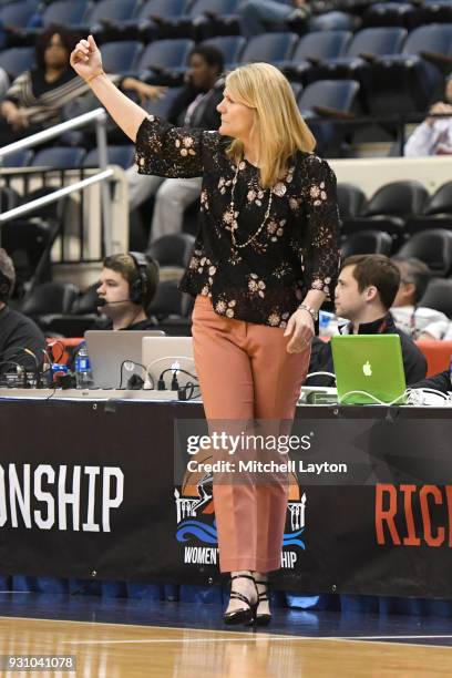 Head coach Cindy Griffin of the St. Joseph Hawks looks on during the semifinal round of the Atlantic-10 Women's Basketball Tournament against the...