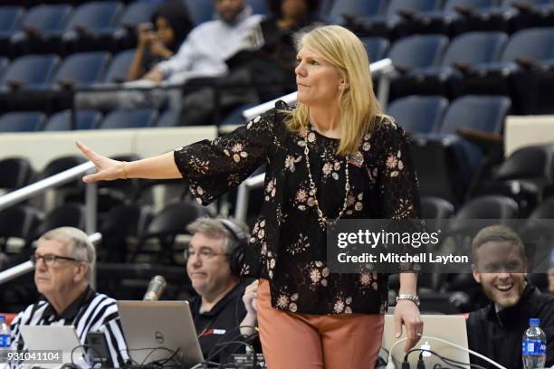 Head coach Cindy Griffin of the St. Joseph Hawks looks on during the semifinal round of the Atlantic-10 Women's Basketball Tournament against the...