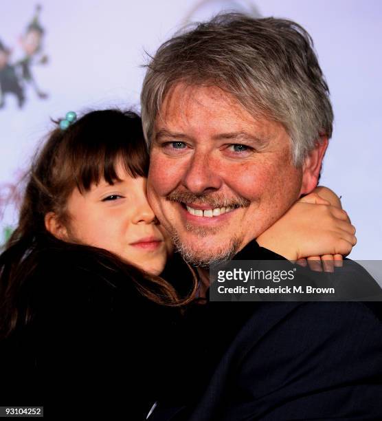 Actor Dave Foley and his daughter attend the "Prep & Landing" film premiere at The El Capitan Theatre on November 16, 2009 in Hollywood, California.