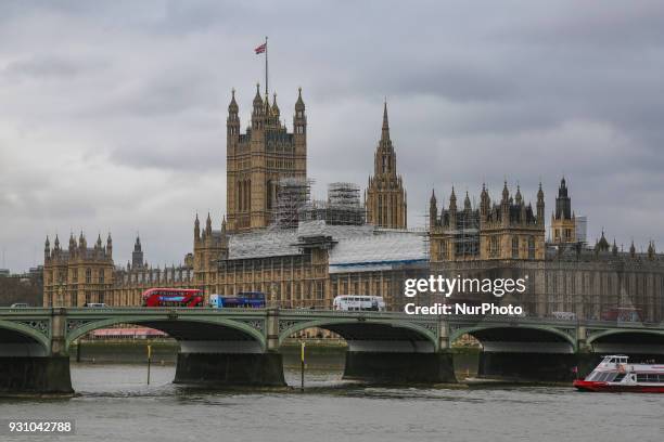 View of Palace of Westminster in London, UK, on 20 February 2018. Houses of Parliament. It hosts the two houses of Parliament of the United Kingdom,...